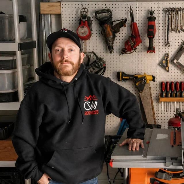 Glenn, co-owner of CW Services LLP, in his Taunton MA shop